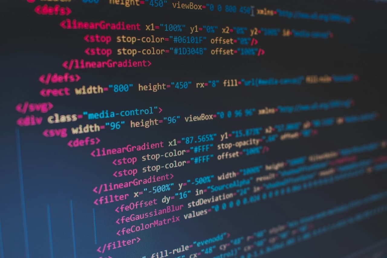Source code on a screen representing REST API design, versioning, and error semantics